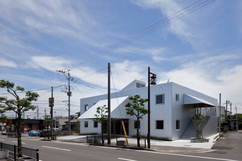 intermedia completes japanese nursing home with triangular wooden canopy