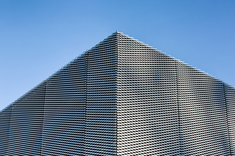 marte marte architects covers hofen castle extension in austria with translucent aluminum mesh designboom
