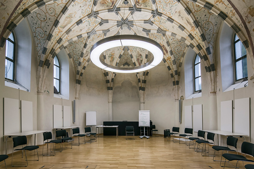 marte marte architects covers hofen castle extension in austria with translucent aluminum mesh designboom