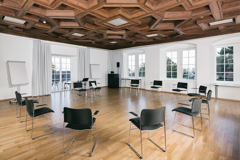 marte marte architects covers hofen castle extension in austria with translucent aluminum mesh designboom