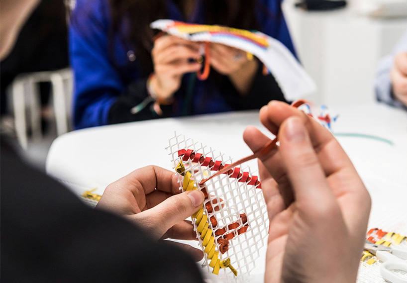 numen/for use constructs adult playground of woven blue tunnels in london car park