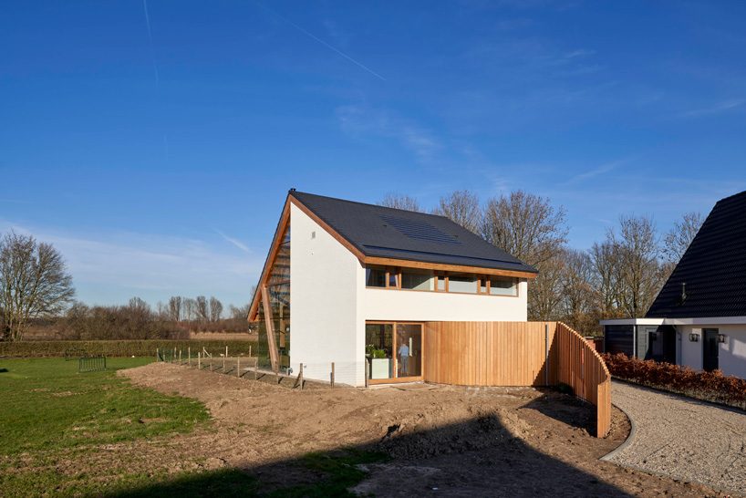  RV architecture completes gabled-roof wooden barnhouse in werkhoven, the netherlands