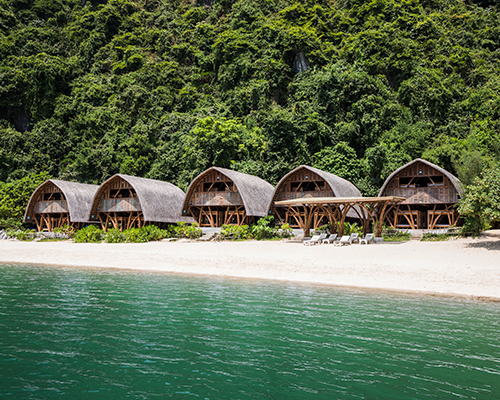 VTN architects' bamboo 'castaway island' resort gently occupies a vietnamese island shore