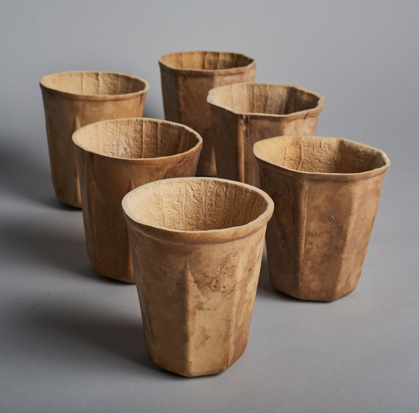 https://www.designboom.com/wp-content/uploads/2019/03/new-starbucks-coffee-cup-biodegradable-creme-designboom-2.jpg