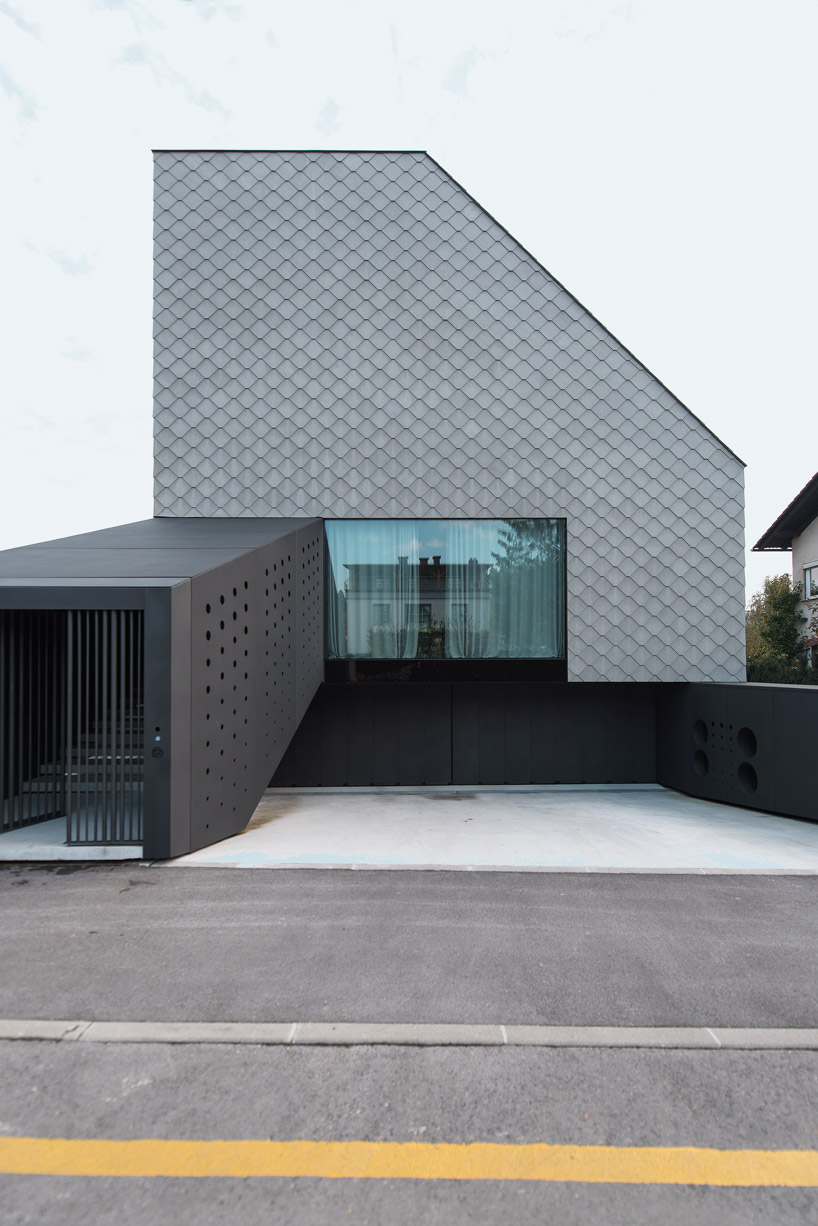 OFIS inserts an internal glazed atrium in the heart of 'house portico' in ljubljana designboom