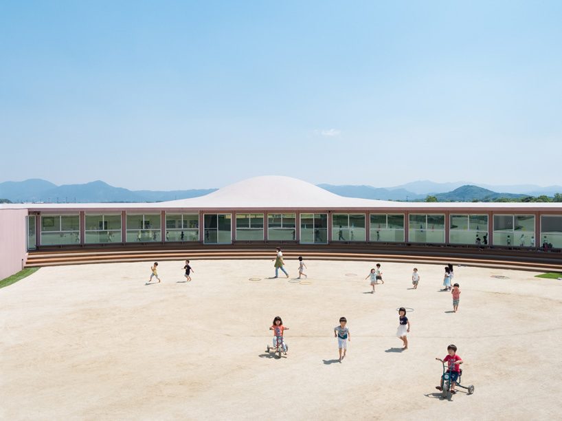 ryuji fujimura tops subaru nursery school in japan with curved concrete roof
