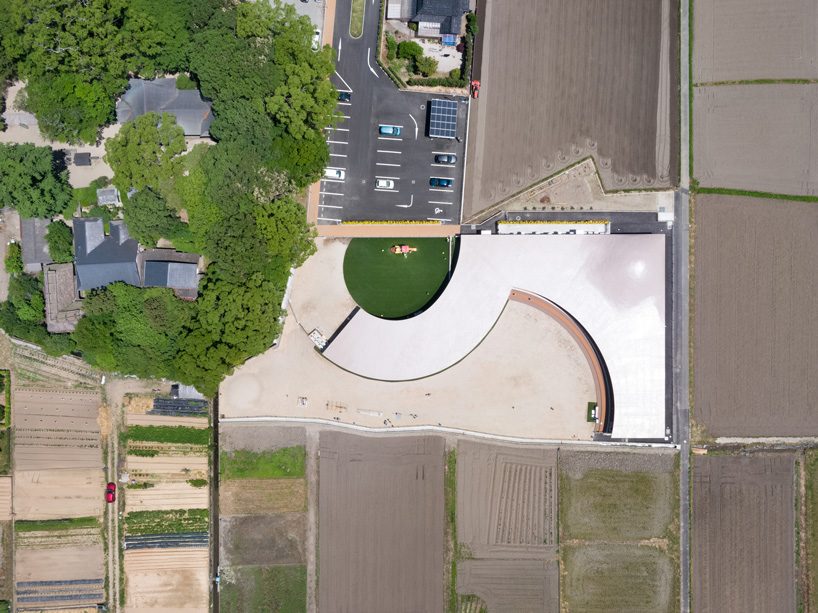 ryuji fujimura tops subaru nursery school in japan with curved concrete roof