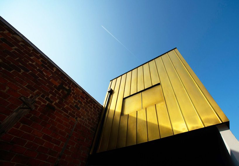 studio malka architecture adds golden block extension to residential refurbishment in paris