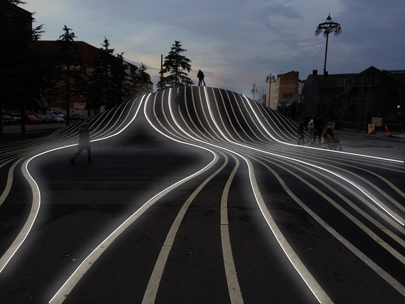 la linea by BIG for artemide, a luminous strip that moves freely in space designboom