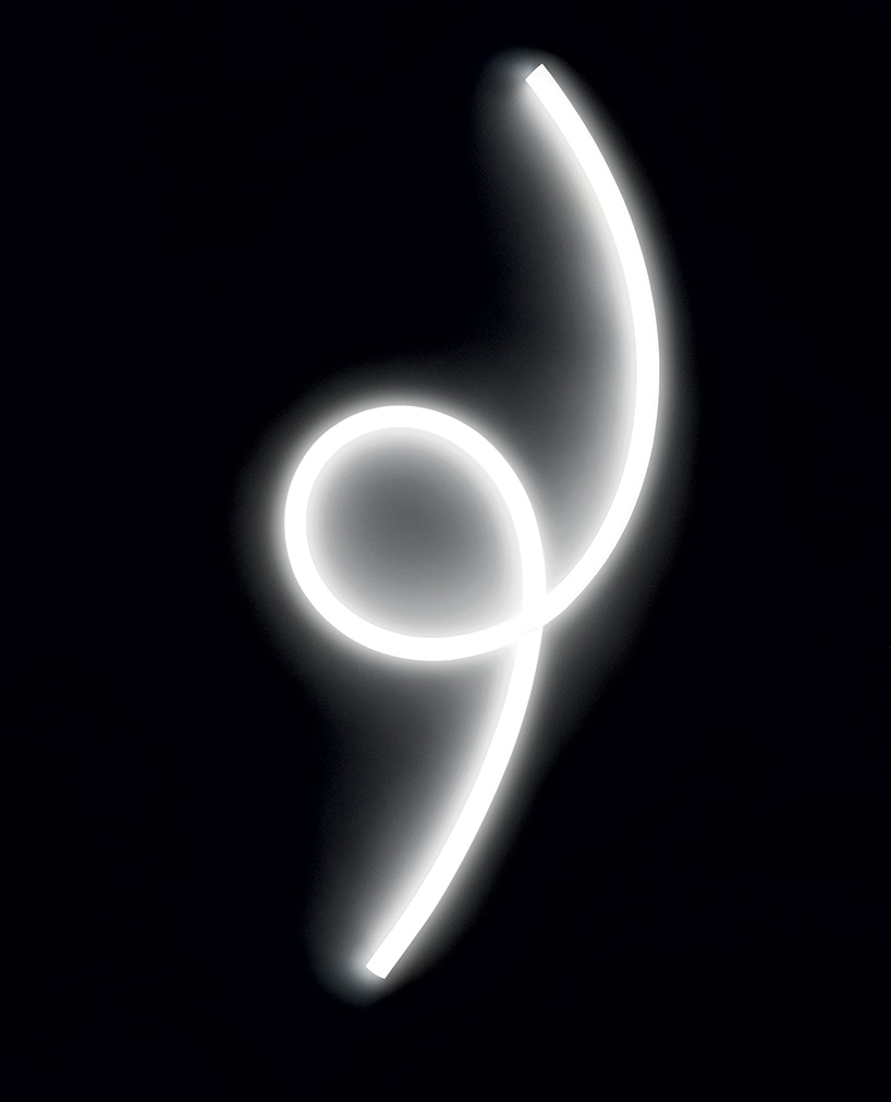 la linea by BIG for artemide, a luminous strip that moves freely in space designboom