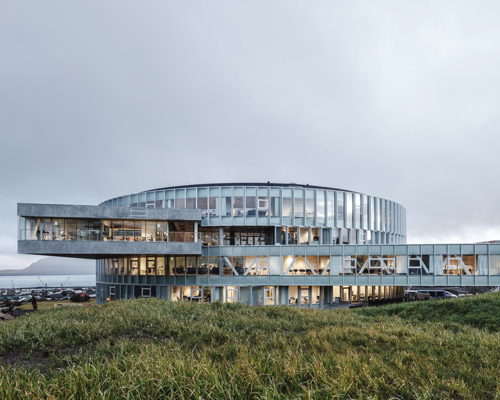 BIG nestles 'glasir' college into the undulating landscape of the faroe islands