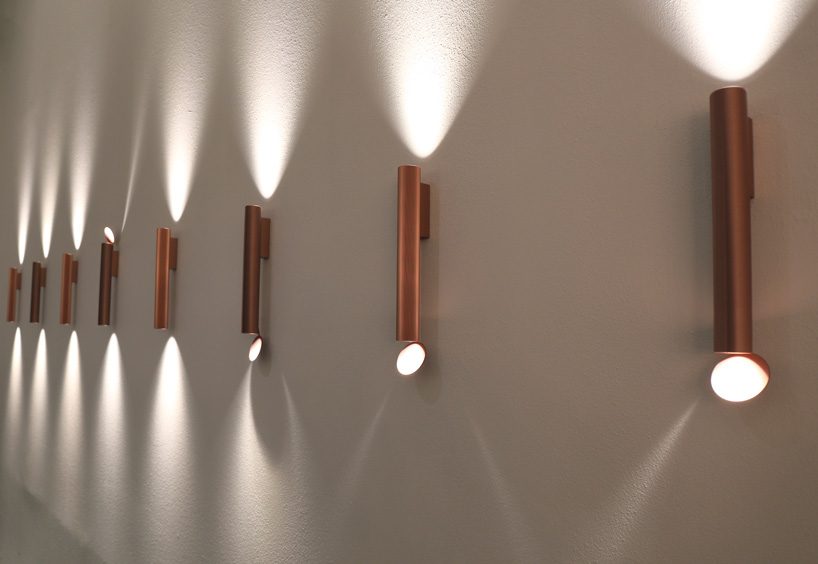 pinball corridor introduces visitors to flos' iconic designs and new pieces at salone del mobile