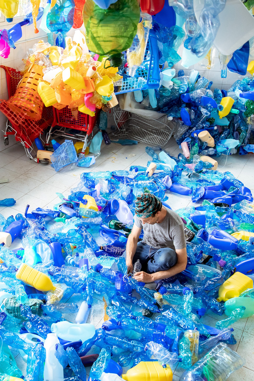 christian holstad + FPT industrial exhibit huge cornucopia made of plastic waste in venice