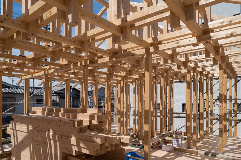 kazuya morita builds wooden lattice frame structure for archive library in kyoto - 8