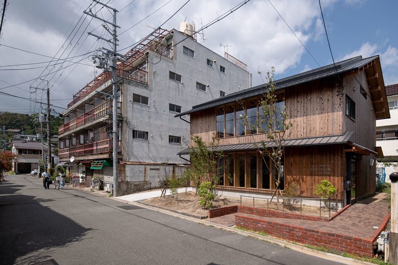 kazuya morita builds wooden lattice frame structure for archive library in kyoto - 7