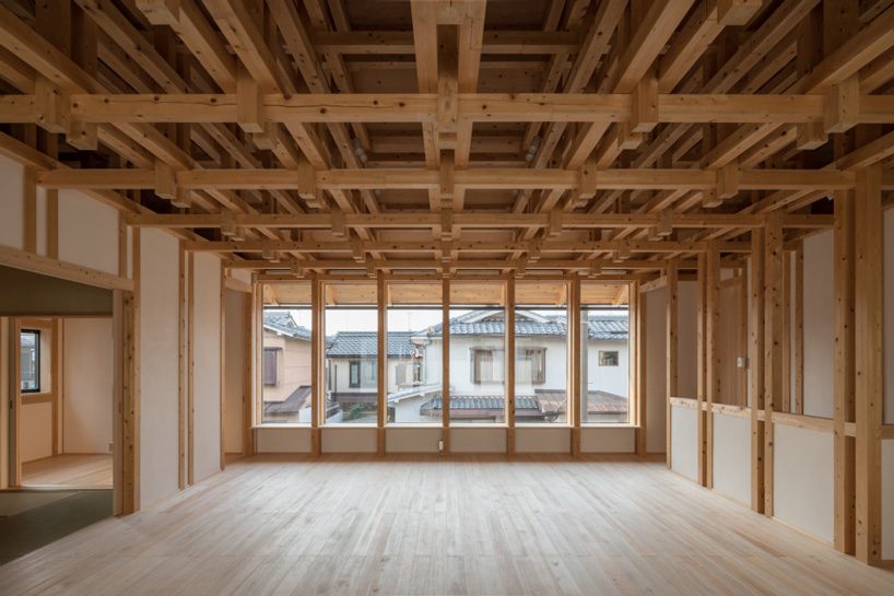 kazuya morita builds wooden lattice frame structure for archive library in kyoto - 1