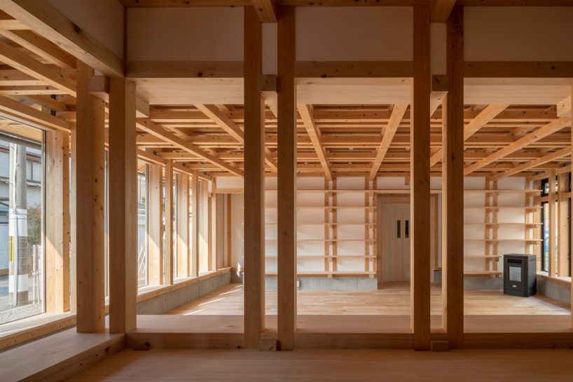 kazuya morita builds wooden lattice frame structure for archive library in kyoto - 3