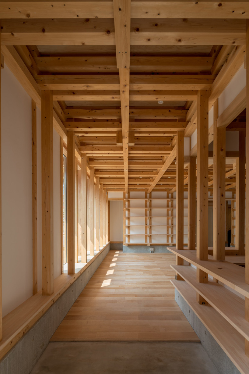 kazuya morita builds wooden lattice frame structure for archive library in kyoto - 4