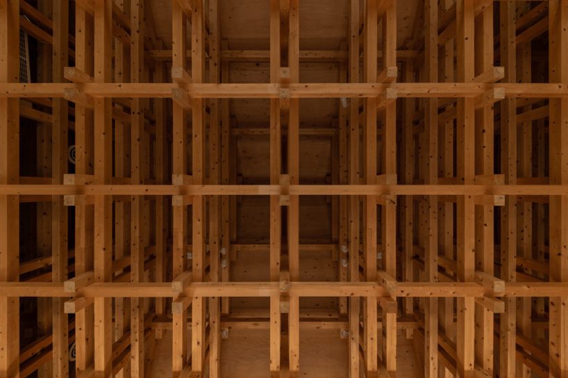 kazuya morita builds wooden lattice frame structure for archive library in kyoto - 5
