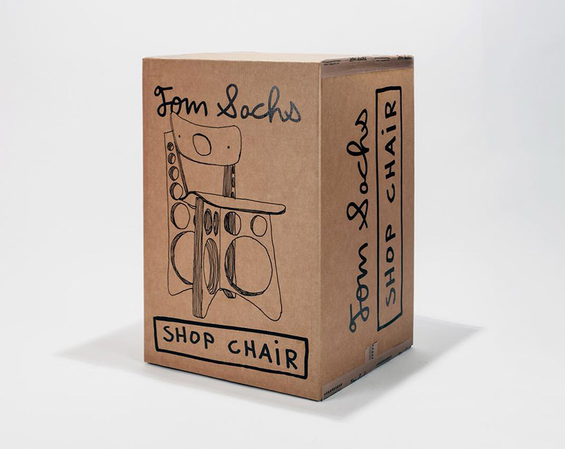 tom sachs punctuates circular holes throughout limited gray edition of shop chair designboom