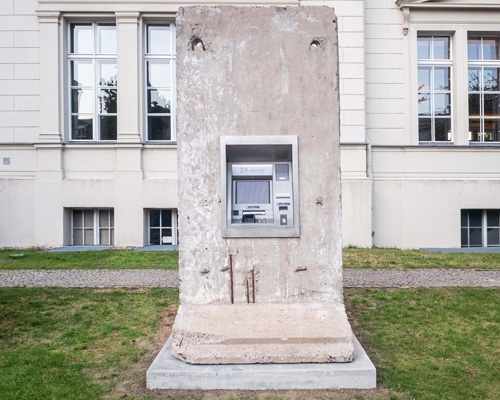 elmgreen & dragset insert 24-hour ATM onto concrete segment of the berlin wall