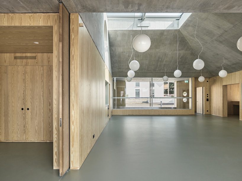 estrada reichen + malte kloes combine kindergarten with underground car park in switzerland - 2