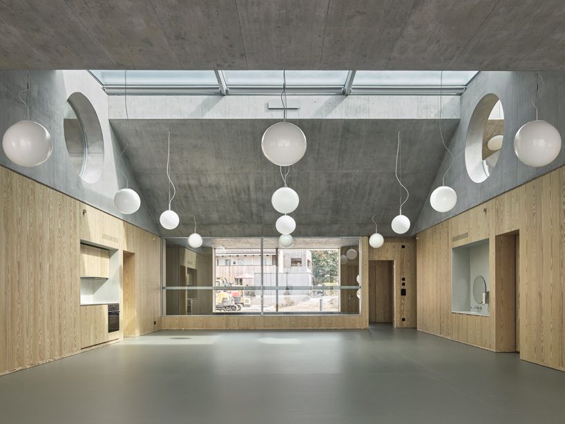 estrada reichen + malte kloes combine kindergarten with underground car park in switzerland - 3