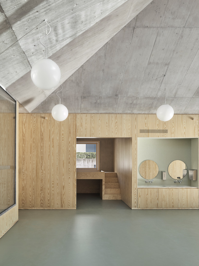 estrada reichen + malte kloes combine kindergarten with underground car park in switzerland - 4