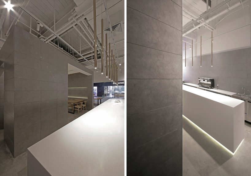 jun murata / JAM uses exposed concrete and brass accents for shanghai's cafe la loop 86 designboom