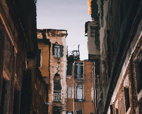 a reflected world of venice is captured in mayank thammalla's latest photo series