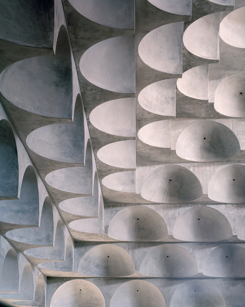102 quarter-spherical concrete domes adorn punchbowl mosque by candalepas associates