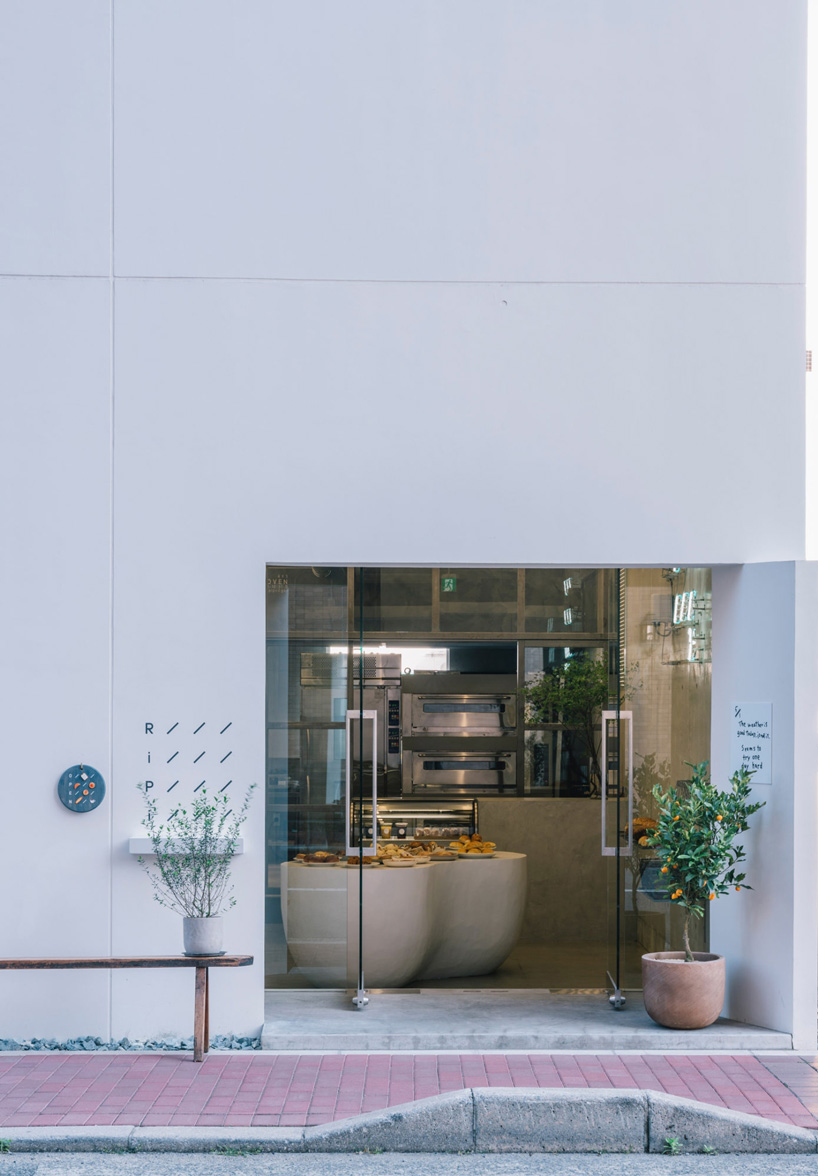 fathom designs japanese bakery ripi as a continuous space of concrete and glass