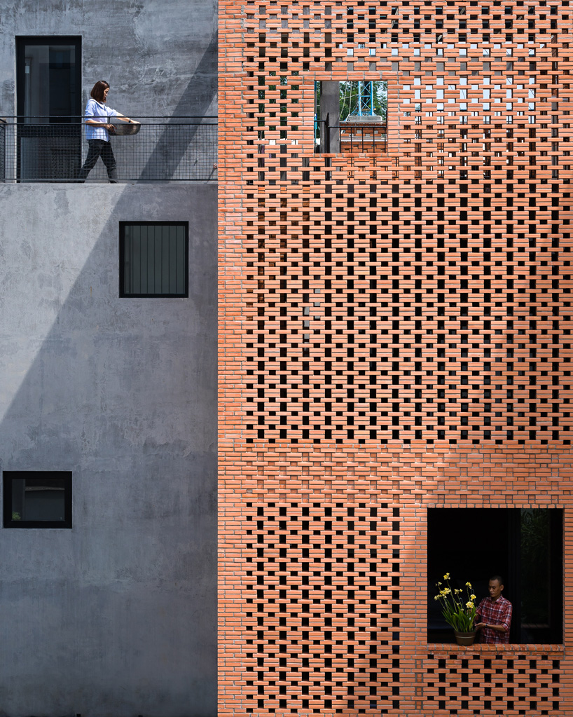 tropical space combines perforated clay brick + concrete for NDC house in vietnam