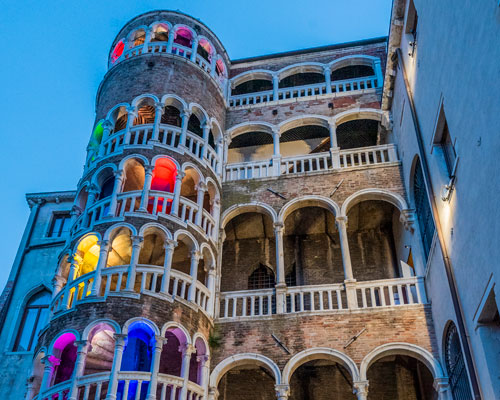 a 15th century venetian spiral staircase is transformed into chromatic lightscape