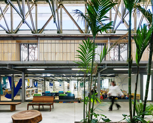 andrade morettin arquitectos + GOAA repurpose industrial sheds into beacon school in brazil