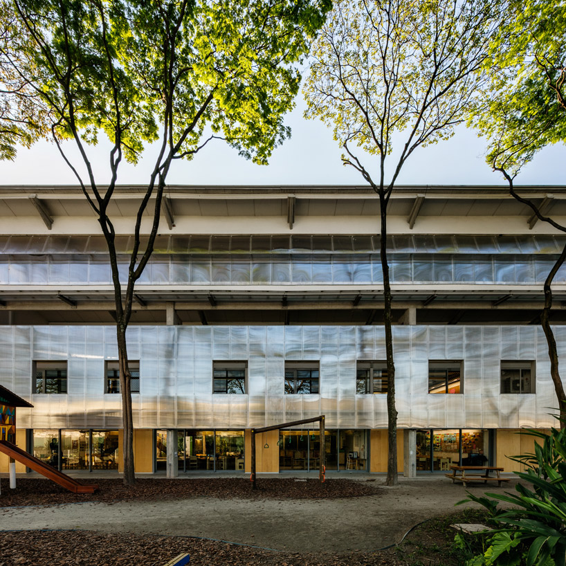 andrade morettin arquitectos + GOAA repurpose industrial sheds into beacon school in brazil - 1