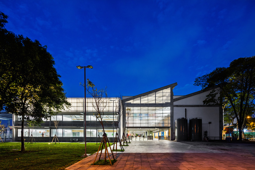 andrade morettin arquitectos + GOAA repurpose industrial sheds into beacon school in brazil - 3