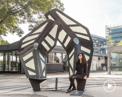 this adaptive pavilion has folding elements that open and close like ladybird wings