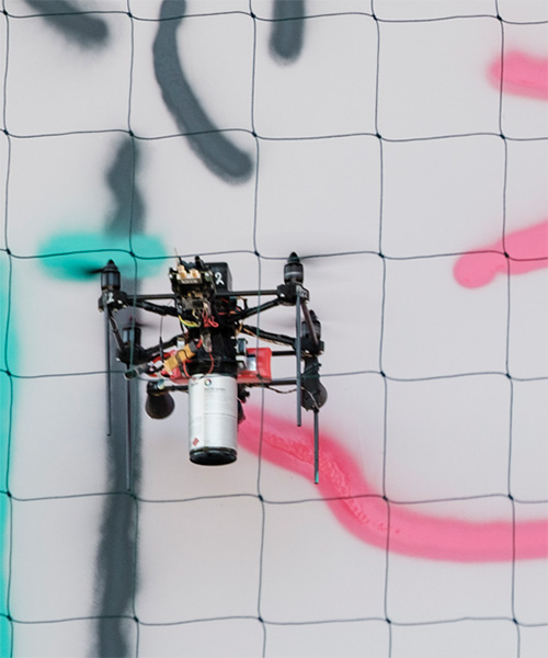 carlo ratti employs a flock of drones to spraypaint crowdsourced