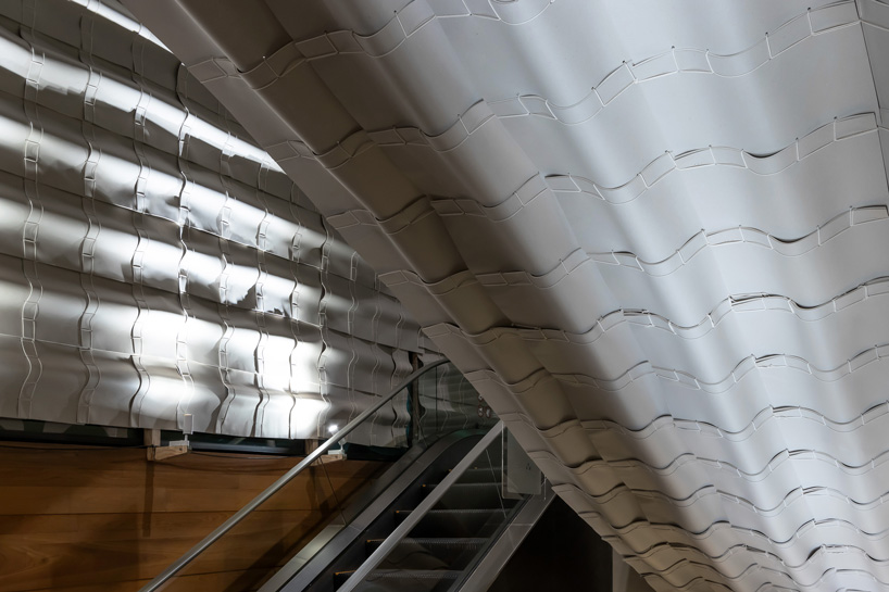 cheng-tsung feng translates chinese stitched binding into wooden installation in taipei - 5