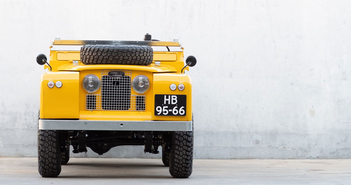 Coolnvintage And Deus Ex Machina Present A Motorcycle Hauling Land Rover