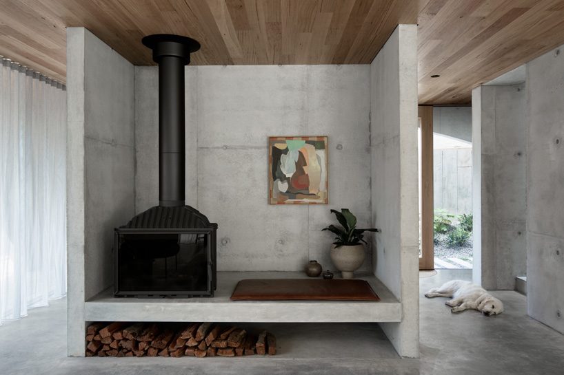 edition office combines pair of arched concrete shells for house in hawthorn, australia