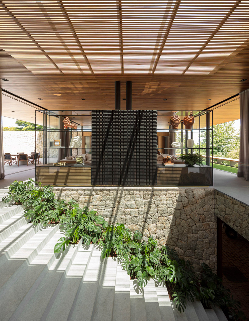  jacobsen arquitetura plans the FL house as slender transparent volume in brazil