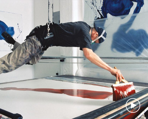 james nares suspends himself over the canvas to create large-scale, single-swipe paintings
