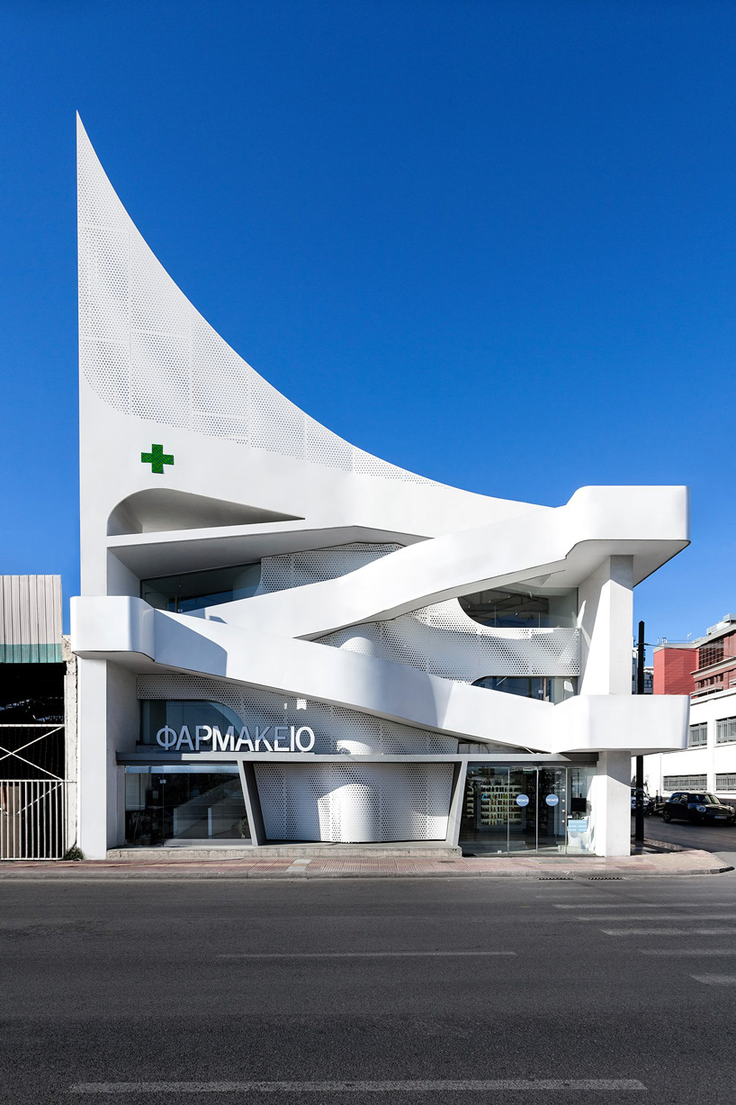  klab architecture completes pharmacy with triangular perforated façade in piraeus, greece