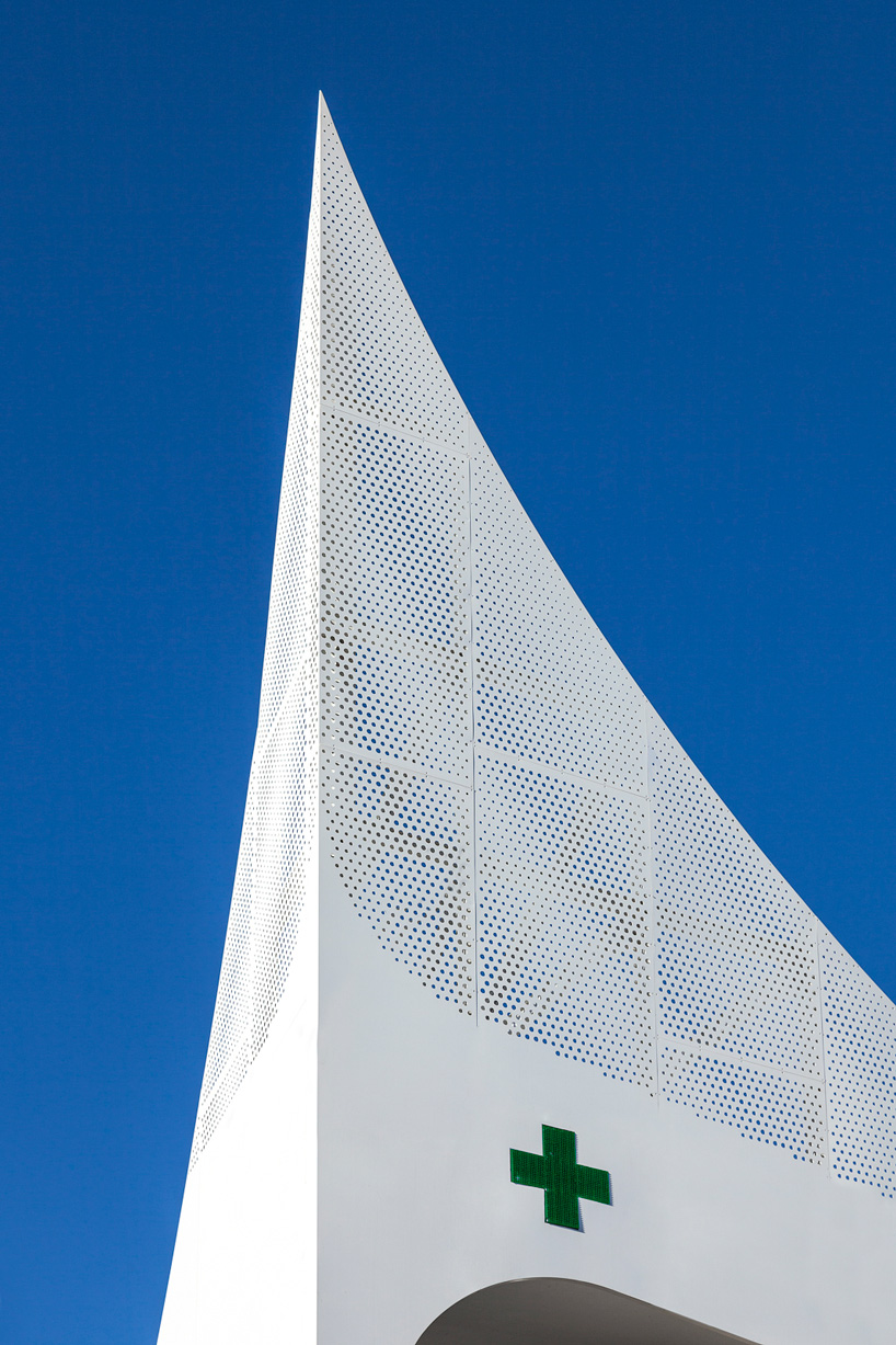  klab architecture completes pharmacy with triangular perforated façade in piraeus, greece