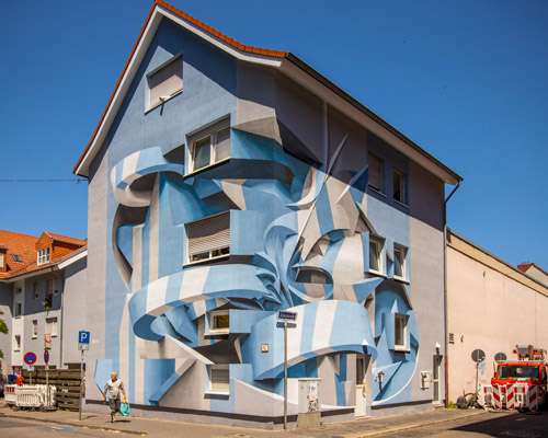 peeta paints large-scale optical illusion murals to transform buildings