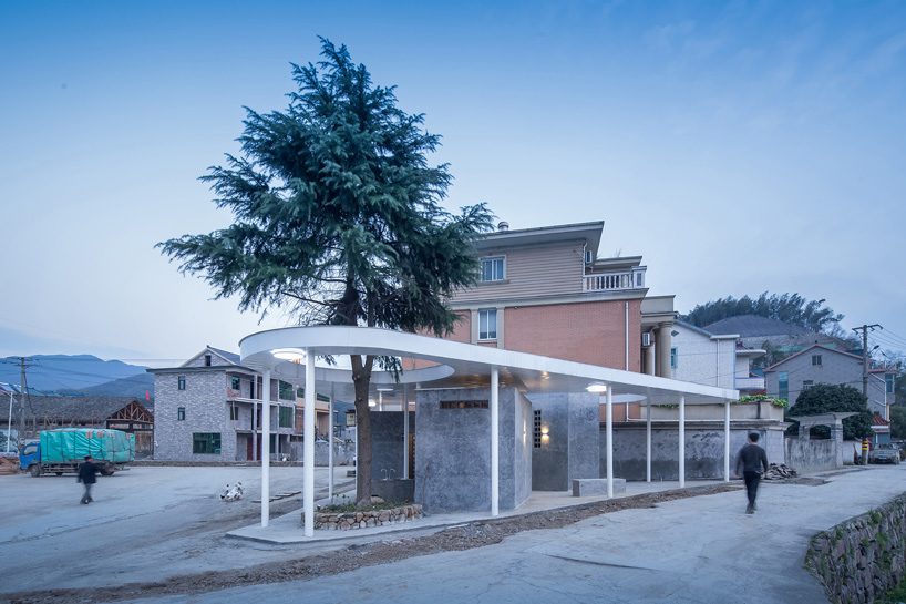  shulin architectural design unites individual blocks under curved roof for public toilet in china