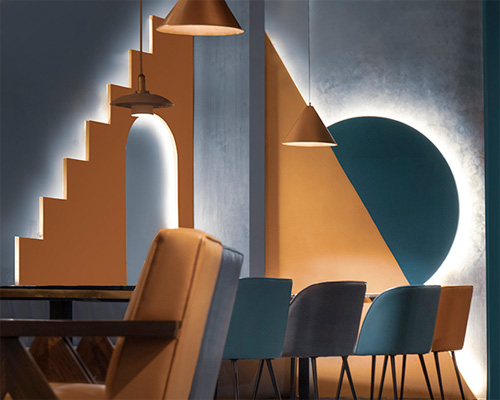 brightly colored volumes shape indian restaurant by RENESA