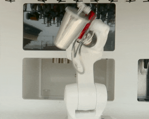 carlo ratti’s robotic bartender mixes drinks on a milanese rooftop